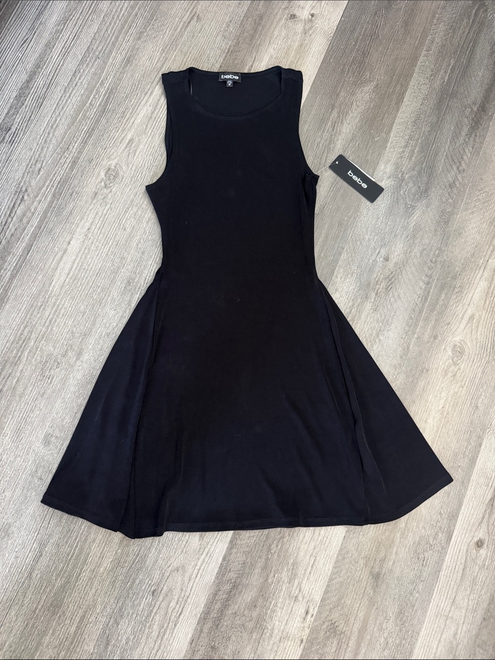 bebe Black Sleeveless Flared Knit Mini Dress Size M NWT